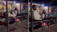 Video of man lying on burning coals to keep warm in winter leaves many with mixed feels
