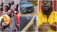 Ajagurajah flaunts GH¢20k cash, Benz and Mazda in video, brags about his wealth