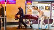 Police looking for men who took dead man to Post Office to collect his pension