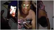 Mum with wrapper screams for joy & lays flat on floor after her son cut his dreadlocks, video causes stir