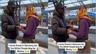 White woman begs Ghanaian man for money on the streets of Germany