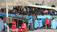 Migrant boat docks in Crete after dramatic rescue