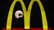 McDonald's profits dented by food poisoning outbreak