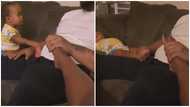 Small side chick: Little girl tells dad to massage her foot in funny video after catching him doing it to wife