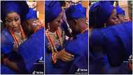 Emotional video shows a Nigerian groom on his knees crying hard at his traditional wedding, bride comforts him