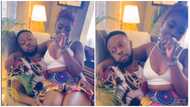 Kalybos pampers Ahuofe Patricia: Actor places her on his lap and gives her baby treatment