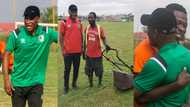 Mark of humility - New Kotoko coach Prosper Odum interacts with groundsman