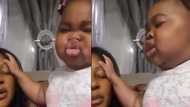 Cute girl captured in video pouring serious 'tongues' on her mother; many react massively