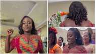 Ghanaian bride trends with her stunning corset Kente dress that covers her heavy cleavage