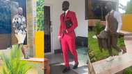 Fashion master: Former Ghana captain Stephen Appiah slays in all-red suit