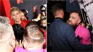 UFC Star McGregor and Machine Gun Kelly fight on the red carpet at MTV VMAs