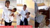 Nigerian lady uses her baby to cheat in exam hall, gets caught, disgraced in video, many react