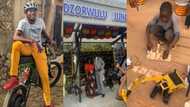 A look at 3 Ghanaians who built electric bike, excavator, and solar-powered bus shelter in 2022