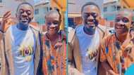 Lil Win meets a young boy in Kumasi, gifts him cash and promises to feature him in his future projects