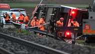 Fifteen hurt as two Swiss trains derail in storm