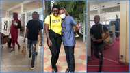 Ghanaian ladies in love with Afua Asantewaa's husband as he carries her bag in video