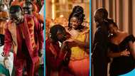Black Stars player Gideon Mensah's wife looks resplendent in a thigh-high kente gown for her lavish wedding