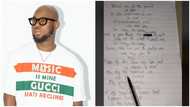 A fan wrote out King Promise's Terminator lyrics on a paper, fans admire his lovely handwriting