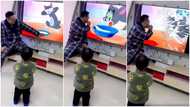 Lovely father makes son laugh as he pretends to be stealing cartoon character's food in viral video