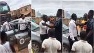 Ghanaian men argue seriously with Quick Credit debt collectors in public: "Is this how to collect your money"