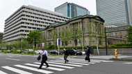 Yen holds gains, markets bounce after Bank of Japan move