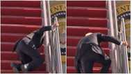 Video drops showing US President Joe Biden falling on aeroplane stairs