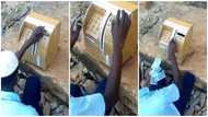 Talented young boy invents manual 'ATM' that dispenses cash, operates it in viral video