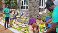 Mercy Johnson's husband sings, dances with aged widows in his village, gives out fine fabrics, bags of rice