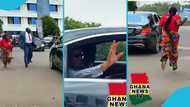 Ghanaian woman sparks mixed reactions as she chases after Mahama's car, video goes viral