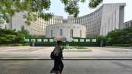 China central bank cuts two key rates to support flagging economy