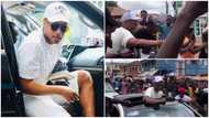 Dede Ayew makes grand appearance in Sunyani, fans mob his plush car in video