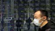 Asian markets struggle as traders contemplate more rate hikes