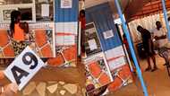 Local waakye seller goes next level; gives customers special tag numbers in video