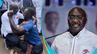 Bawumia humbly bends down to share hug with physically challenged man