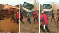 No be juju be dat? Nigerians surprised after 5 men pull up fallen lorry with rope, video goes viral