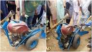 Innovative man converts motorcycle to tractor, displays how it works, people gather, admire it