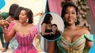 NPP's Alfred Kumi's gorgeous wife trends as she flaunts her bosoms in a beaded kente gown for her plush wedding