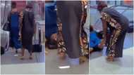 Moment woman embarrassingly falls and somersaults after stepping on escalator captured on camera, many react