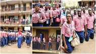Old students relive secondary school days as they march in their school's uniform to class after 30 years