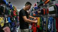 Tariff uncertainty delays World Cup orders for China's merch makers