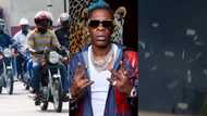 No Be Juju: Shatta Wale shows okada riders street love as he sprays cash on them in video