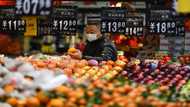 Asian markets mixed as traders pause ahead of US inflation data
