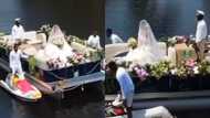 Video of pretty bride arriving at her wedding venue on beautiful boat with jet skis goes viral