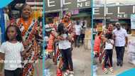 Gifty Anti takes her little daughter on a tour at Makola market