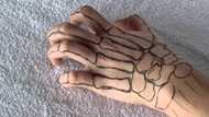 20 fascinating skeleton hand tattoo ideas to decorate your skin