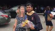 Emotional photos of Filipino posing with cardboard cutout of his late mother on graduation day
