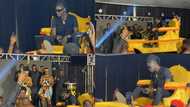 Highlife King: Kuami Eugene rides in a palanquin to perform on stage