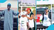 Michy dresses Shatta Wale's son Majesty in an apron as they sell by the roadside again