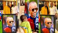 Fadda Dickson splashes cash on physically challenged artist who used his mouth draw a painting of him