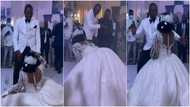 Bride "scatters" dance floor with amazing dancing skills as she twerks in wedding gown, video pops up